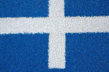 Detail of the marking of the paddle tennis court and blue ground color.