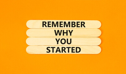 Remember why you started symbol. Concept word Remember why you started on beautiful wooden stick....