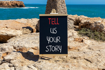 Tell us your story symbol. Concept word Tell us your story on beautiful black chalk blackboard....
