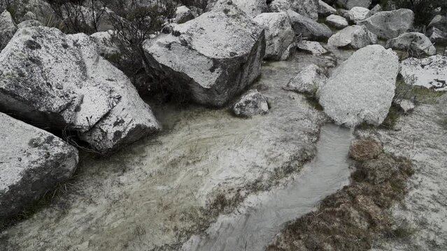 lively river on the way to the laguna Paron in the high altitude of the cordillera blanca in remote Andes of Peru.