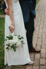 Bride and groom. Just married. Happy couple walking away.