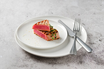 Grilled tuna steak on a plate