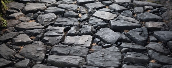 A macro shot of a cobblestone pathway, highlighting the rugged and irregular textures of the stones, each one with a unique character.
