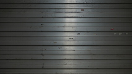 Old and dirty metal shutter door of a closed store