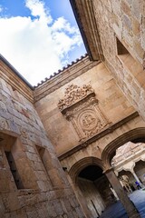 Fototapeta premium Vertical of the mesmerizing architecture of the monumental city Salamanca in Spain