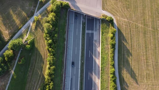 Top view of a German highway with traffic into the city of Munich. Concept of road transportation