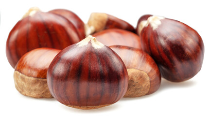 Edible sweet chestnuts isolated on white background.