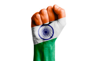 Man hand fist of INDIA flag painted. Close-up.