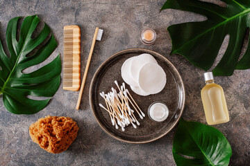 zero waste eco friendly hygiene bathroom concept. wooden toothbrush reusable pads wood buds brush