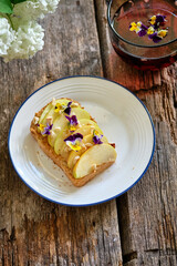 Breakfast. Toast with peanut butter, pear, viola.