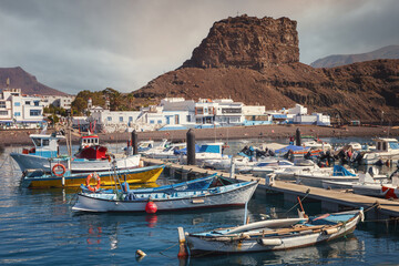 Fototapeta na wymiar Boats moored in the port of Agaete, Gran Canaria, Spain