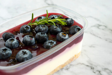 Blueberry cheesecake on a marble table