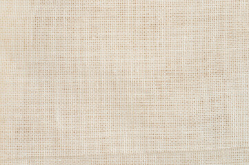 Fototapeta na wymiar Beige color texture of sackcloth yarn