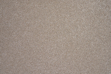 Fototapeta na wymiar Texture of clean beach wet sand