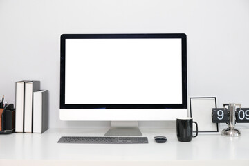 Workspace mockup computer desktop on table with comfortable office