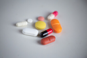 different form and kind of pills on the white background