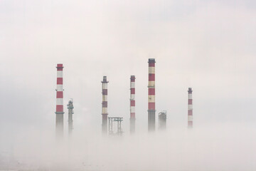 Oil refinery in the smog