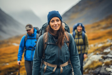 Female mountain guide leading a group of hikers