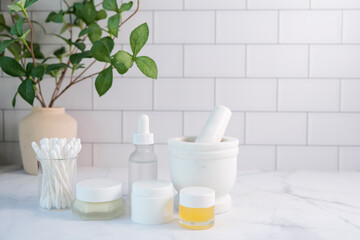 Beauty products and skincare set for self-care, spa and wellness concept. Facial care cream in the bathroom..