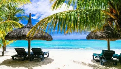 Gordijnen Tropical vacation. Luxury resorts of  Mauritius island. Exotic holidays. relaxing beach scenery with umbrellas © Freesurf