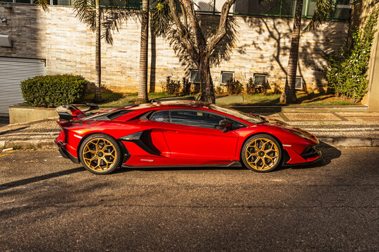 Rosso Khonsu Red Lamborghini Aventador SVJ Side View, street, sunset light - High Resoltuion Image