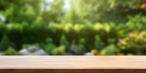 Fototapeta premium Wood table top on blur garden background, product display montage
