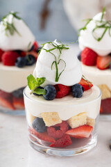 Pound cake and berries layered dessert in a cup, dessert in a glass