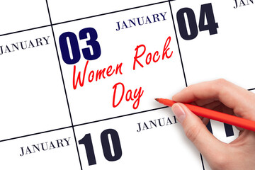 January 3. Hand writing text Women Rock Day on calendar date. Save the date.