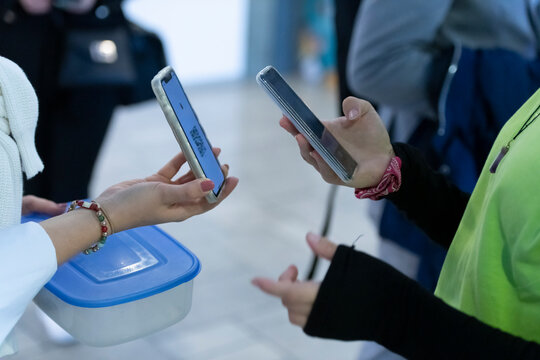 Event QR code ticket scanning. Businessman registering for a business conference using his smart phone