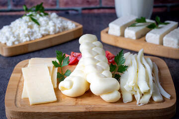 Traditional various cheeses, string, knitted and cecil cheese, turkish delicatessen concept