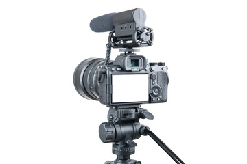 Photo, video camera with microphone. Digital or Dslr camera on tripod. Photographer or videographer studio for recording film project. Professional blogger, television equipment. Camera, display, lens - obrazy, fototapety, plakaty
