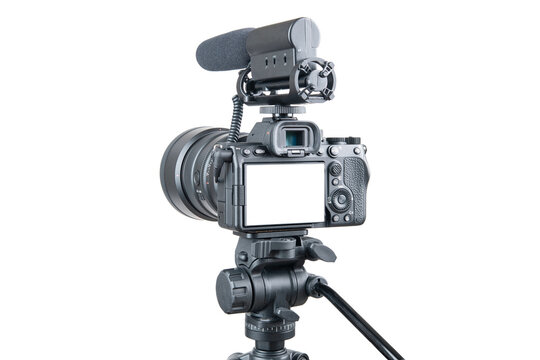 Photo, video camera with microphone. Digital or Dslr camera on tripod. Photographer or videographer studio for recording film project. Professional blogger, television equipment. Camera, display, lens