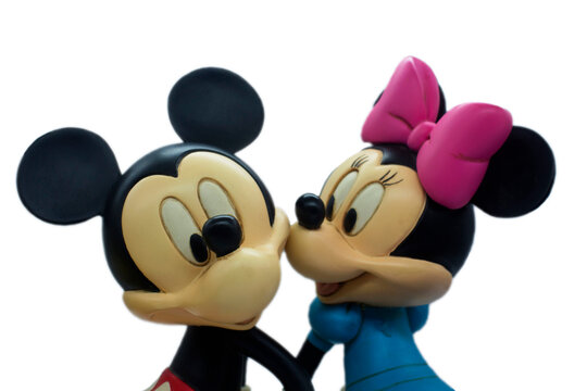 Studio image of Mickey Mouse and Minnie Mouse on a white isolated background.