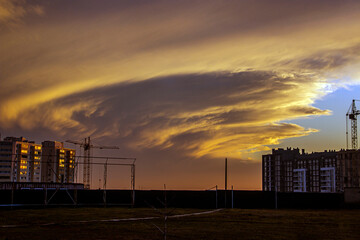 Swirling clouds in the sky at sunset