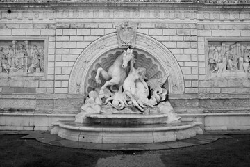 Old fountain of pincio in bologna italy. white horse statue in marble. Old building in italy, 