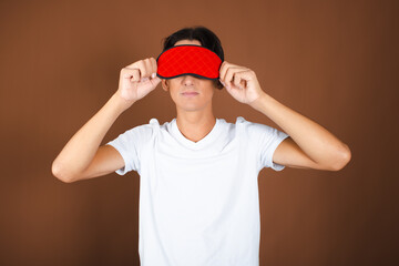 A young attractive student is waiting for gifts for the New Year and Christmas.