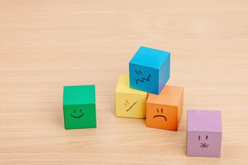 World mental health day. Paper men figures with different emotions. Feedback rating