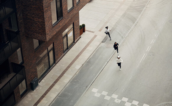 Women jogging on a city street