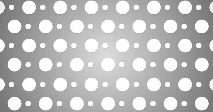 Circles aligned in lines growing and shrinking alternatively. Abstract circle seamless loop animated shape motion graphics background of grey color.