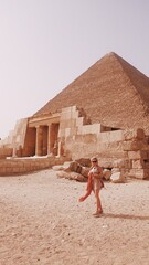 European woman a front of Giza pyramid in Cairo Egypt travel photography 