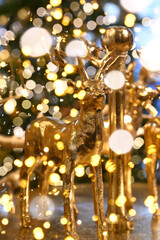 Christmas deer decoration with fairy lights in a xmas store.