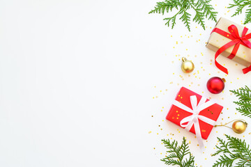 Christmas Present box and decorations at white background. Top view with copy space.