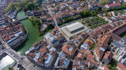 Fototapeta na wymiar Verdun's intricate rooftops and alleys seen from sky