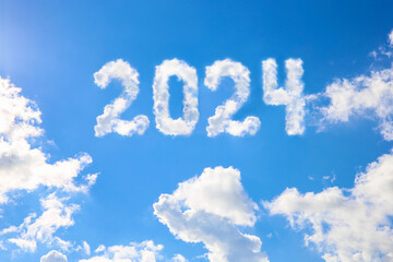 2024 year written on a blue sky of clouds. Concept of happy New year.