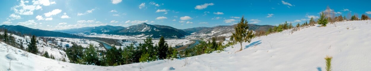 beautiful winter panorama in the mountains on a sunny day