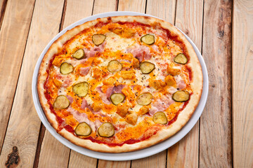 tasty pizza on the wooden board