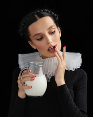 Fashion Happy young woman drinking milk
