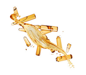Group of broken yellow ampoules with splashes in the air isolated on a white background