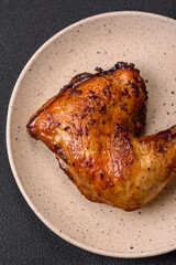Delicious grilled chicken leg or quarter with salt and spices