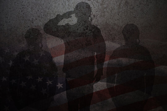 Silhouettes of soldiers saluting rusty on iron background with image of USA flag.